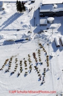 Saturday March 10, 2012  Aerial view of the Nulato checkpoint, with 5-time Iditarod champion, Rick Swenson, approaching the checkpoint. Iditarod 2012.