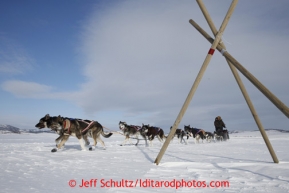 Sonny Lindner passes a race marker as he heads into the Unalakleet checkpoint on Sunday March 10, 2013.Iditarod Sled Dog Race 2013Photo by Jeff Schultz copyright 2013 DO NOT REPRODUCE WITHOUT PERMISSION