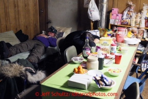 Volunteer veterinarian Roger Troutman gets a nap early in the morning at the Kaltag checkpoint on Sunday March 10, 2013.Iditarod Sled Dog Race 2013Photo by Jeff Schultz copyright 2013 DO NOT REPRODUCE WITHOUT PERMISSION