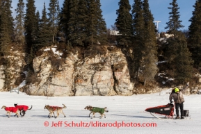 Jeff King waves goodbye to the crowd in White Mountain on Monday, March 10, during the Iditarod Sled Dog Race 2014.PHOTO (c) BY JEFF SCHULTZ/IditarodPhotos.com -- REPRODUCTION PROHIBITED WITHOUT PERMISSION