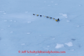 Jessie Royer on Golovin Bay on Monday, March 10, during the Iditarod Sled Dog Race 2014.PHOTO (c) BY JEFF SCHULTZ/IditarodPhotos.com -- REPRODUCTION PROHIBITED WITHOUT PERMISSION