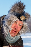 Ken Anderson shorlty after arriving in the morning at the checkpoint in Manley Hot Springs at 30 below zero on March 10, 2015.  This is the second checkpoint of the 2015 Iditarod.(C) Jeff Schultz/SchultzPhoto.com - ALL RIGHTS RESERVED DUPLICATION  PROHIBITED  WITHOUT  PERMISSION