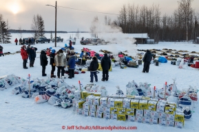 Musher food bags await the arrival of more mushers as the top 10 teams rest in Tanana in the early evening on March 10, 2015.   2015 Iditarod.(C) Jeff Schultz/SchultzPhoto.com - ALL RIGHTS RESERVED DUPLICATION  PROHIBITED  WITHOUT  PERMISSION