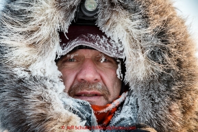 Allen Moore is frosted up on his arrival in the morning at the checkpoint in Manley Hot Springs.  This is the second checkpoint of the 2015 Iditarod.(C) Jeff Schultz/SchultzPhoto.com - ALL RIGHTS RESERVED DUPLICATION  PROHIBITED  WITHOUT  PERMISSION