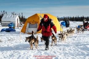 Aliy Zirkle leads her dogs through the Cripple checkpoint on Thursday March 10 during Iditarod 2016.  Alaska.    Photo by Jeff Schultz (C) 2016  ALL RIGHTS RESERVED