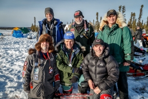 Volunteer vets pose for a group photo at the Cripple checkpoint on Thursday March 10 during Iditarod 2016.  Alaska.    Photo by Jeff Schultz (C) 2016  ALL RIGHTS RESERVED