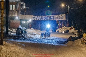 Katherine Keith leaves the Takotna checkpoint in the early morning on Thursday March 10 during Iditarod 2016.  Alaska.    Photo by Jeff Schultz (C) 2016  ALL RIGHTS RESERVED