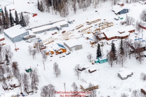 Teams rest on straw around the village of Grayling community center checkpoint on the Yukon River on Saturday, March 10th during the 2018 Iditarod Sled Dog Race -- AlaskaPhoto by Jeff Schultz/SchultzPhoto.com  (C) 2018  ALL RIGHTS RESERVED