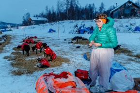 Meredith Mapes begins her dog chores in the early morning hours at the ghost-town checkpoint of Iditarod on Saturday, March 10th during the 2018 Iditarod Sled Dog Race -- AlaskaPhoto by Jeff Schultz/SchultzPhoto.com  (C) 2018  ALL RIGHTS RESERVED
