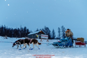 Lev Shvarts leaves on the trail in the early morning hours at the ghost-town checkpoint of Iditarod on Saturday, March 10th during the 2018 Iditarod Sled Dog Race -- AlaskaPhoto by Jeff Schultz/SchultzPhoto.com  (C) 2018  ALL RIGHTS RESERVED