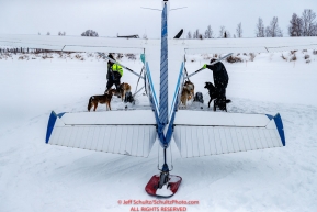 Dropped dogs wait to be loaded into Jerry Wortley's plane at the ghost-town checkpoint of Iditarod on Saturday, March 10th during the 2018 Iditarod Sled Dog Race -- AlaskaPhoto by Jeff Schultz/SchultzPhoto.com  (C) 2018  ALL RIGHTS RESERVED