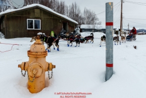 Ramey Smyth and team run past a fire hydrant as he leaves the Kaltag checkpoint on Sunday morning March 10th during the 2019 Iditarod Trail Sled Dog Race.Photo by Jeff Schultz/  (C) 2019  ALL RIGHTS RESERVED