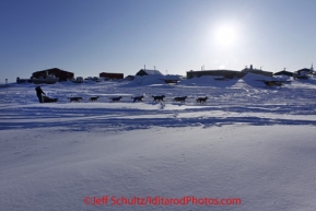 Sunday March 11, 2012  Brent Sass arrives on the sloug at Unalakleet.   Iditarod 2012.