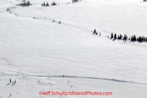 Sunday March 11, 2012 A dog team travels along the trail between Kaltag and Unalakleet, approximately 10 miles from the Unalakleet checkpoint.  Iditarod 2012.