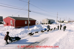 Bob Bundtzen approaches the National Guard Armory checkpoint building at Shaktoolik on Monday March 11, 2013.Iditarod Sled Dog Race 2013Photo by Jeff Schultz copyright 2013 DO NOT REPRODUCE WITHOUT PERMISSION