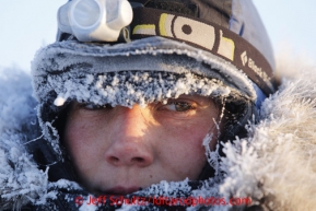 Jessica Hendricks is frosted up at 7 below shorlty before she leaves theUnalakleet checkpoint on Monday March 11, 2013.Iditarod Sled Dog Race 2013Photo by Jeff Schultz copyright 2013 DO NOT REPRODUCE WITHOUT PERMISSION