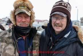 Sonny Lindner and his good friend, 5-time Iditarod champion Rick Swenson at Nome on Tuesday March 11th during the 2014 Iditarod Sled Dog Race.PHOTO (c) BY JEFF SCHULTZ/IditarodPhotos.com -- REPRODUCTION PROHIBITED WITHOUT PERMISSION