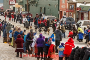 Martin Buser runs into the finish chute to finish in 6th place at Nome on Tuesday March 11th during the 2014 Iditarod Sled Dog Race.PHOTO (c) BY JEFF SCHULTZ/IditarodPhotos.com -- REPRODUCTION PROHIBITED WITHOUT PERMISSION