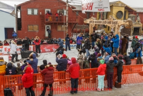 Martin Buser runs into the finish chute to finish in 6th place at Nome on Tuesday March 11th during the 2014 Iditarod Sled Dog Race.PHOTO (c) BY JEFF SCHULTZ/IditarodPhotos.com -- REPRODUCTION PROHIBITED WITHOUT PERMISSION