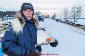 Volunteer Comms Jerry Trodden works the checkpoint on the banks of the Yukon river at the Tanana checkpoint on Wednesday morning  March 11th during the 2015 Iditarod.(C) Jeff Schultz/SchultzPhoto.com - ALL RIGHTS RESERVED DUPLICATION  PROHIBITED  WITHOUT  PERMISSION