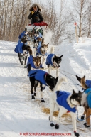 Rookie musher Laura Allaway runs down the bank down to the Yukon River at the Tanana checkpoint Wednesday afternoon March 11th during the 2015 Iditarod.(C) Jeff Schultz/SchultzPhoto.com - ALL RIGHTS RESERVED DUPLICATION  PROHIBITED  WITHOUT  PERMISSION