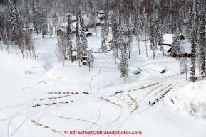 Teams rest at the Kokrine Hills Bible camp on the Yukon River about half way between Tanana and Ruby on Wednesday afternoon  March 11th during the 2015 Iditarod.(C) Jeff Schultz/SchultzPhoto.com - ALL RIGHTS RESERVED DUPLICATION  PROHIBITED  WITHOUT  PERMISSION