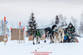 Jeff King and team run down the bank and onto the Koyukuk River as they leave the Huslia checkpoint during the 2017 Iditarod on Saturday morning March 11, 2017.Photo by Jeff Schultz/SchultzPhoto.com  (C) 2017  ALL RIGHTS RESERVED