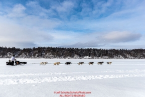 Rick Cassillo runs on the Yukon River as he nears the Kaltag village checkpoint on Sunday afternoon March 11th during the 2018 Iditarod Sled Dog Race -- AlaskaPhoto by Jeff Schultz/SchultzPhoto.com  (C) 2018  ALL RIGHTS RESERVED