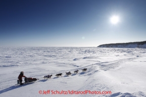 Sunday March 11, 2012  Aliy Zirkle runs on the sea ice after leaving Elim. Iditarod 2012.