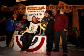 Mitch Seavey, center, 53, with, from left, Karen Hagedorn, Chuck Talskey, Gary Samuelson and Stan Foo after pulling into Nome first and winning his second Iditarod sled dog race on Tuesday March 12, 2013. Seavey made the journey from Willow in 9 days, 7 hours, 39 minutes, 56 seconds. Iditarod Sled Dog Race 2013Photo by Jeff Schultz copyright 2013 DO NOT REPRODUCE WITHOUT PERMISSION
