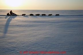 John Baker on the Bering Sea shortly after leaving the Elim checkpoint on Tuesday March 12, 2013.Iditarod Sled Dog Race 2013Photo by Jeff Schultz copyright 2013 DO NOT REPRODUCE WITHOUT PERMISSION