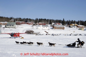 Pete Kaiser runs down the Fish River as he makes his way into the White Mountain checkpoint on Tuesday March 12, 2013.Iditarod Sled Dog Race 2013Photo by Jeff Schultz copyright 2013 DO NOT REPRODUCE WITHOUT PERMISSION