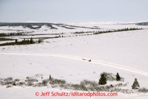 Josh Cadzow on the trail nearing the White Mountain checkpoint on Tuesday March 12, 2013.Iditarod Sled Dog Race 2013Photo by Jeff Schultz copyright 2013 DO NOT REPRODUCE WITHOUT PERMISSION