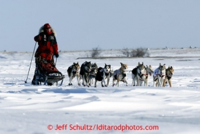 Aily Zirkle races near Cape Nome on Tuesday March 12, 2013.Iditarod Sled Dog Race 2013Photo by Jeff Schultz copyright 2013 DO NOT REPRODUCE WITHOUT PERMISSION