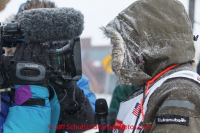 Robert Sorlie is interviewed by the Iditarod Insider at the Nome finish line on Front Street on Wednesday March 12, during the 2014 Iditarod Sled Dog Race.PHOTO (c) BY JEFF SCHULTZ/IditarodPhotos.com -- REPRODUCTION PROHIBITED WITHOUT PERMISSION