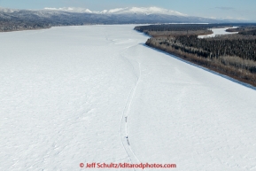 Two teams travel down the Yukon on the way to Ruby in the afternoon on Thursday March 12, 2015 during the 2015 Iditarod (C) Jeff Schultz/SchultzPhoto.com - ALL RIGHTS RESERVED DUPLICATION  PROHIBITED  WITHOUT  PERMISSION