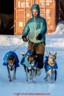 Nicholas Petit gives 3 of his dogs excercise during their 24-hour layover in the evening at the Galena checkpoint on Thursday March 12, 2015 during Iditarod 2015.  (C) Jeff Schultz/SchultzPhoto.com - ALL RIGHTS RESERVED DUPLICATION  PROHIBITED  WITHOUT  PERMISSION