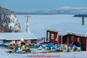 Ray Redington Jr. packs his sled readying for departure in the morning on Thursday March 12, 2015 at the Ruby checkpoint during Iditarod 2015.(C) Jeff Schultz/SchultzPhoto.com - ALL RIGHTS RESERVED DUPLICATION  PROHIBITED  WITHOUT  PERMISSION