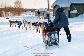 Noah Burmeister works his sled as he rounds a corner on the road leavng the Kaltag checkpoint during the 2017 Iditarod on Sunday evening  March 12, 2017.Photo by Jeff Schultz/SchultzPhoto.com  (C) 2017  ALL RIGHTS RESERVED