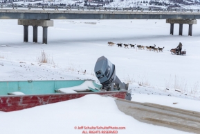 Jeff King runs under the bridge on the Kouwegok slough shortly after leaving the Unalakleet checkpoint on Monday  afternoon March 12th during the 2018 Iditarod Sled Dog Race -- AlaskaPhoto by Jeff Schultz/SchultzPhoto.com  (C) 2018  ALL RIGHTS RESERVED