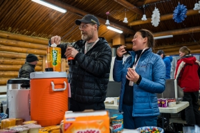 Volunteer veterinarians are checking out the snacks and rations at the checkpoing in Ruby, Alaska.