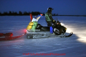 Tuesday March 13, 2012  One of the trail breakers moves out just befor leader Dallas Seavey on the Fish river at White Mountain. Iditarod 2012.