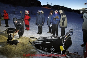 Tuesday March 13, 2012  Race officials watch as Dallas Seavey readies his dogs in White Mountain. Iditarod 2012.