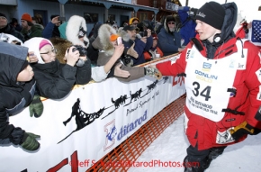 Tuesday March 13, 2012  Dallas Seavey shakes hands with the crowd shorty after winning the 2012 Iditarod.