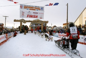 Tuesday March 13, 2012  Aliy Zirkle crosses the finish line in second place in Nome. Iditarod 2012.