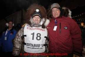 Jeff King poses with race sponsor Stan Foo representing Donlin Gold after finishing in 3rd place in Nome on Wednesday March 13, 2013.Iditarod Sled Dog Race 2013Photo by Jeff Schultz copyright 2013 DO NOT REPRODUCE WITHOUT PERMISSION