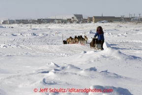 Michelle Phillips runs on the Bering Sea within sight of Nome on Wednesday March 13, 2013. Iditarod Sled Dog Race 2013Photo by Jeff Schultz copyright 2013 DO NOT REPRODUCE WITHOUT PERMISSION