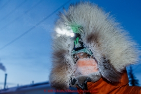 Kelly Maixner arrives frosted after a 35 below zero run from Ruby in the morning at the Galena checkpoint on Friday March 13, 2015 during Iditarod 2015.  (C) Jeff Schultz/SchultzPhoto.com - ALL RIGHTS RESERVED DUPLICATION  PROHIBITED  WITHOUT  PERMISSION