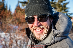 Brent Sass smiles as the first musher to the Koyuk checkpoint on Sunday March 13th during the 2016 Iditarod.  Alaska    Photo by Jeff Schultz (C) 2016  ALL RIGHTS RESERVED