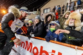 Pete Kaiser waves and shakes hands with the crowd at the Nome finish line after winning the 2019 Iditarod Trail Sled Dog Race. Pete's winning time is 9 days 12 hours 39 minutes and 6 secondsPhoto by Jeff Schultz/  (C) 2019  ALL RIGHTS RESERVED